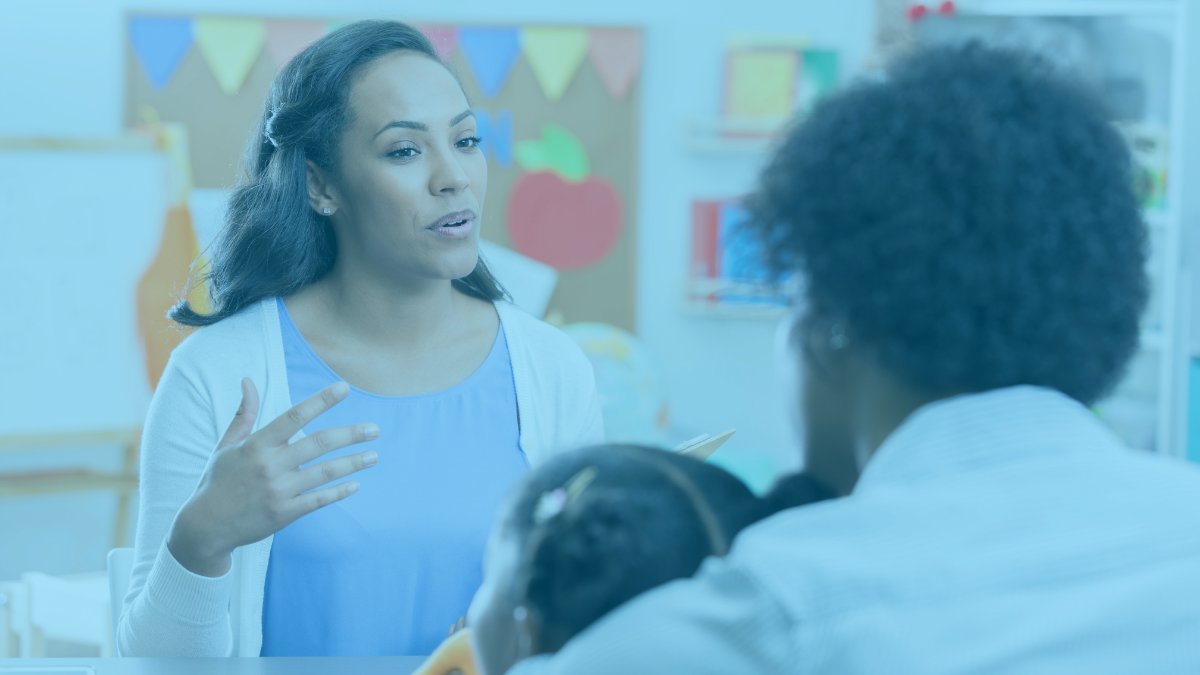 teacher talking to parent and student